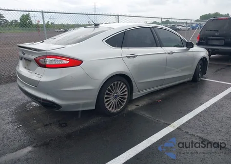 2016 Ford Fusion Titanium z USA, uszkodzony, nr VIN 3FA6P0K95GR220039